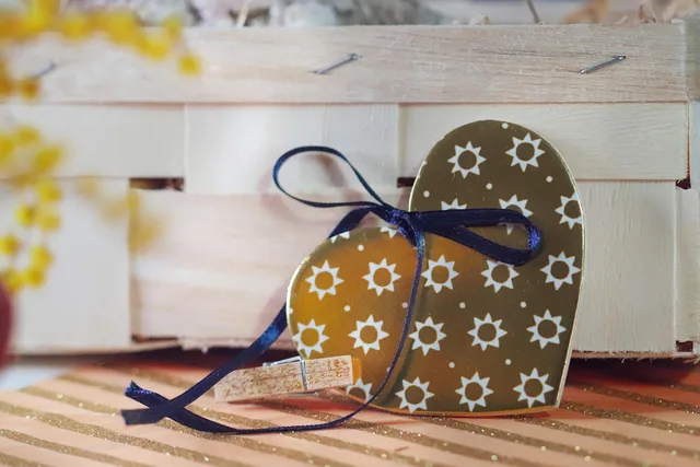 decorative heart, gift tag, rustic decor, wooden crate, handmade, romantic detail, craft design, valentine gift, sunflower pattern, love decoration, heart shape, ribbon bow, packaging design, cozy style, boho decor, romantic symbol, wedding decor, heart ornament, diy decor, artisan detail, small gift, celebration, floral pattern, love tag, wooden background. Packaging marketing workflow: five stages and owners
