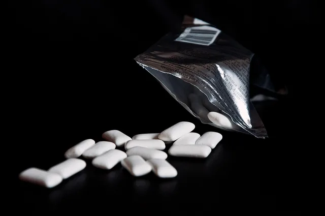 chewing gum, table, scattered, packaging, silver, black background, glittering, chewing gum, chewing gum, chewing gum, chewing gum, chewing gum. Which packaging marketing skills to hire for in England